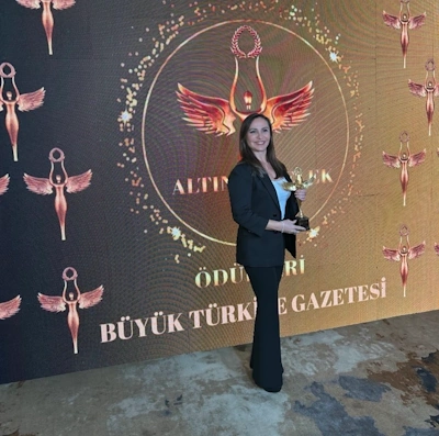 Prof. Dr. Behiye Bolgul with ferns - pediatric dentist